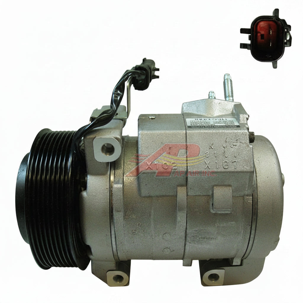 An automotive air conditioning compressor clutch assembly with a black ribbed pulley, silver metal body, and an inset showing a red electrical connector on a white background. Dodge Ram 